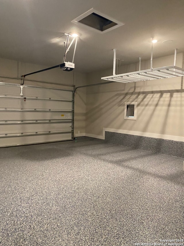 11111 Carlyle Spgs, Live Oak, TX 78233 - garage with baseboards, a garage door opener, and electric panel