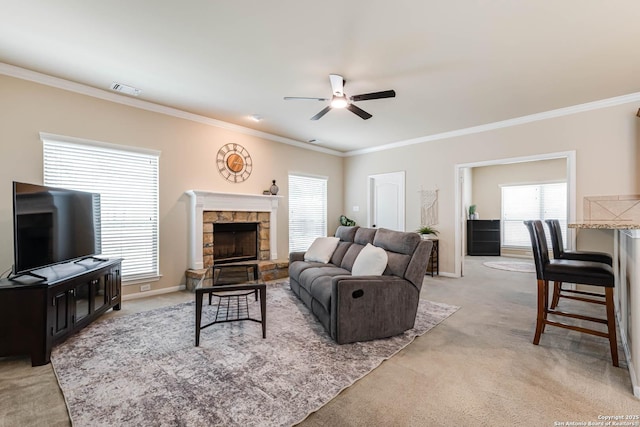 23022 Airedale Ln, San Antonio, TX 78260 - living area featuring ornamental molding, light colored carpet, a ceiling fan, and plenty of natural light