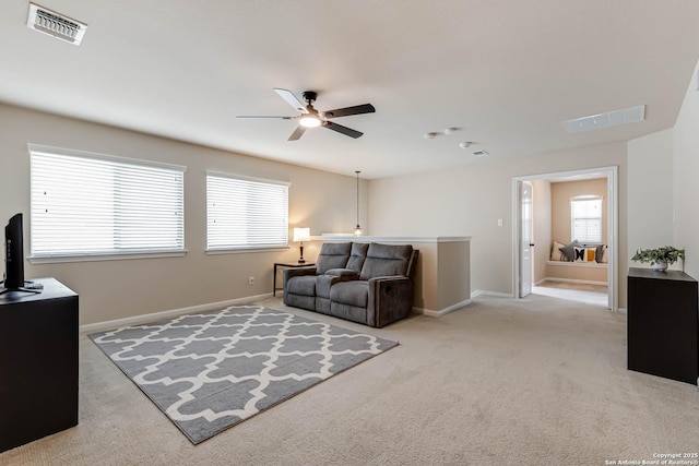 23022 Airedale Ln, San Antonio, TX 78260 - carpeted living area featuring a ceiling fan and baseboards