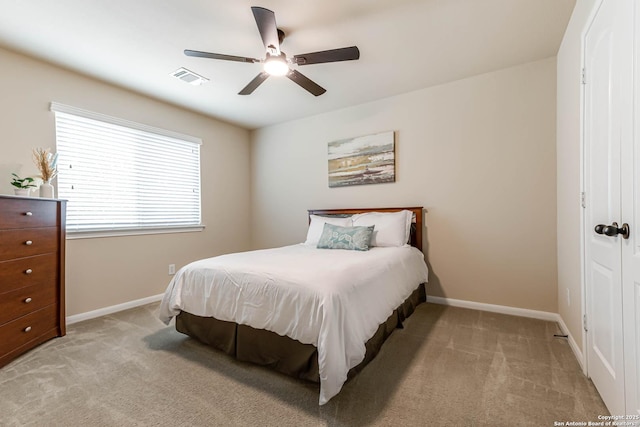 23022 Airedale Ln, San Antonio, TX 78260 - bedroom featuring light colored carpet, baseboards, and a ceiling fan