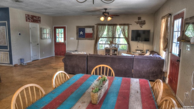 121 David Rankin Rd, Leakey, TX 78873 - dining space with a ceiling fan, plenty of natural light, baseboards, and a textured ceiling