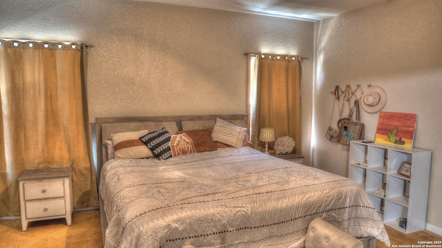121 David Rankin Rd, Leakey, TX 78873 - bedroom featuring a textured wall