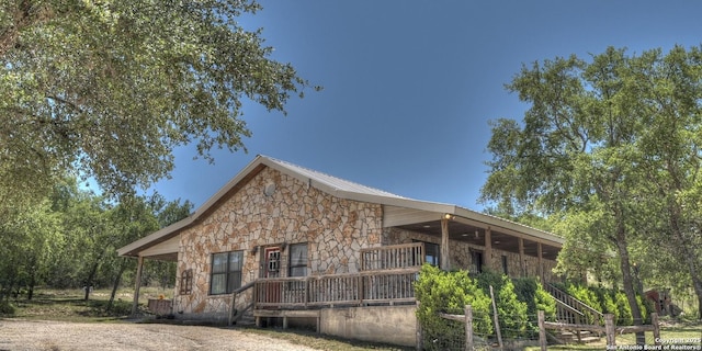 121 David Rankin Rd, Leakey, TX 78873 - view of front of home with stone siding and stairway