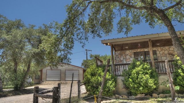 121 David Rankin Rd, Leakey, TX 78873 - view of yard featuring an outbuilding and a garage