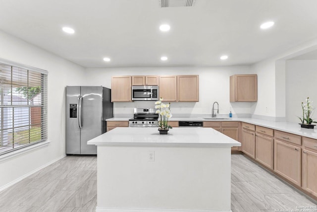 15515 Spring Smt, San Antonio, TX 78247 - kitchen with stainless steel appliances, a sink, a center island, recessed lighting, and light countertops