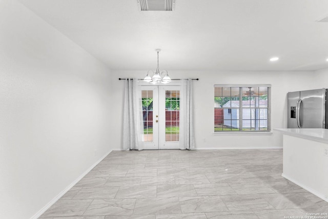 15515 Spring Smt, San Antonio, TX 78247 - unfurnished dining area with light marble finish flooring, plenty of natural light, baseboards, a chandelier, and recessed lighting