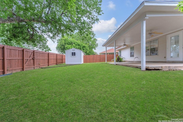 15515 Spring Smt, San Antonio, TX 78247 - view of yard with a ceiling fan, an outbuilding, a storage shed, and a patio
