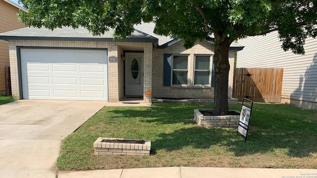 9703 Kashmir, San Antonio, TX 78251 - ranch-style house with an attached garage, driveway, and brick siding