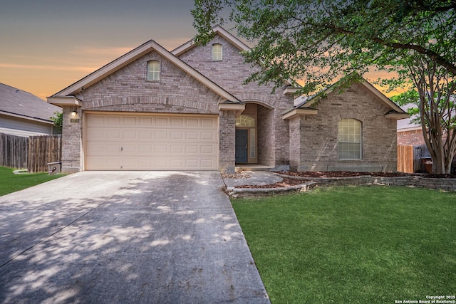 10715 Palomino, San Antonio, TX 78254 - traditional-style house featuring concrete driveway, brick siding, and a garage