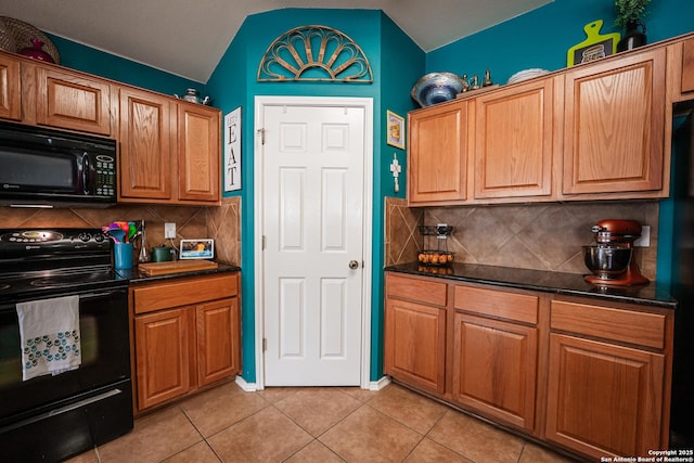 10715 Palomino, San Antonio, TX 78254 - kitchen featuring black appliances, light tile patterned floors, lofted ceiling, decorative backsplash, and brown cabinets