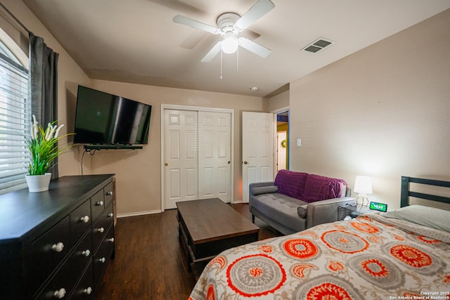 10715 Palomino, San Antonio, TX 78254 - bedroom with dark wood-style flooring, baseboards, a ceiling fan, and a closet
