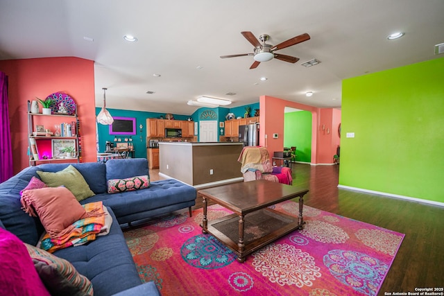 10715 Palomino, San Antonio, TX 78254 - living area featuring wood finished floors, ceiling fan, baseboards, recessed lighting, and lofted ceiling