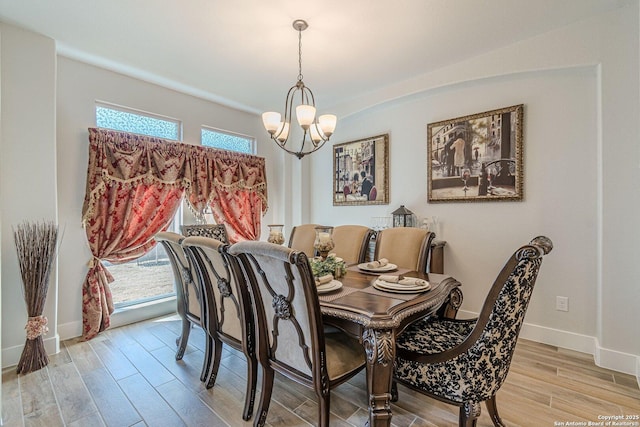 2564 Ayers, Seguin, TX 78155 - dining room featuring a chandelier, light wood-style floors, and baseboards