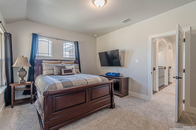 2564 Ayers, Seguin, TX 78155 - bedroom featuring vaulted ceiling, light carpet, and baseboards