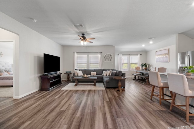 6038 Ballast Trl, New Braunfels, TX 78132 - living room featuring wood finished floors, ceiling fan, and baseboards