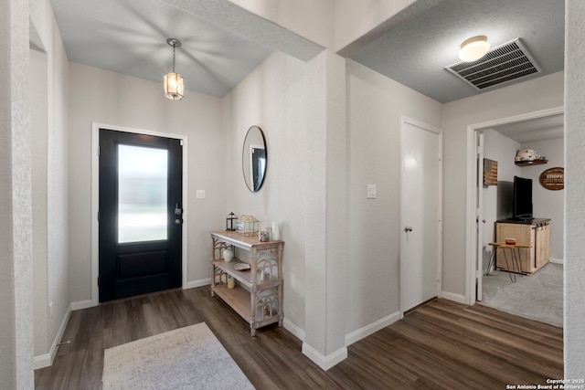 6038 Ballast Trl, New Braunfels, TX 78132 - entryway with wood finished floors and baseboards