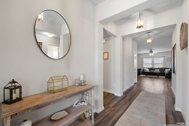 6038 Ballast Trl, New Braunfels, TX 78132 - corridor with dark wood-style flooring and baseboards
