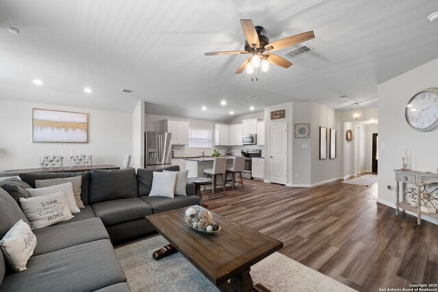 6038 Ballast Trl, New Braunfels, TX 78132 - living area featuring wood finished floors, a ceiling fan, recessed lighting, and baseboards