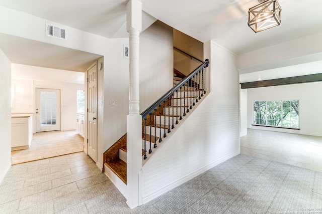 15021 Seven L Trl, Helotes, TX 78023 - stairway with plenty of natural light and baseboards