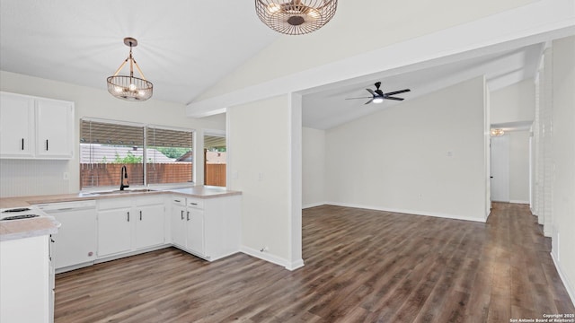 5815 Freemans Farm St, San Antonio, TX 78233 - kitchen with vaulted ceiling, a sink, white dishwasher, light countertops, and wood finished floors