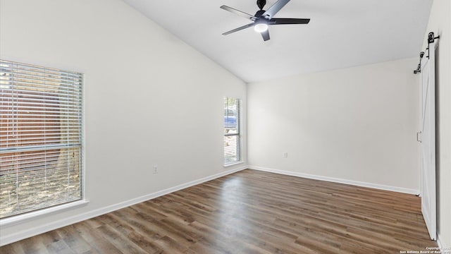 5815 Freemans Farm St, San Antonio, TX 78233 - unfurnished room featuring a barn door, ceiling fan, wood finished floors, high vaulted ceiling, and baseboards