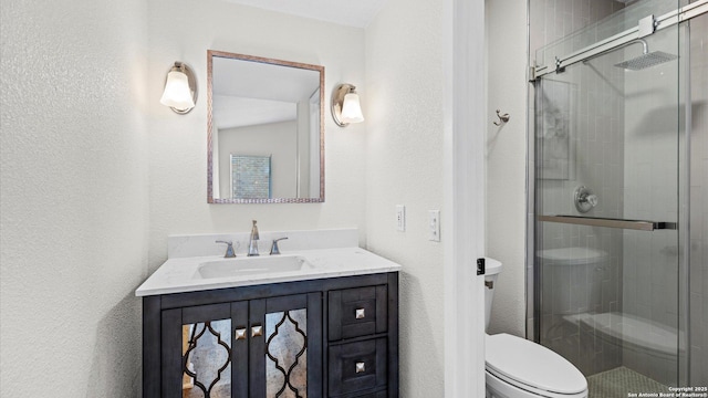5815 Freemans Farm St, San Antonio, TX 78233 - full bath with a textured wall, toilet, a stall shower, and vanity