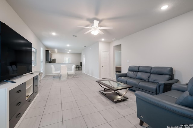 7731 Chatham, San Antonio, TX 78218 - living area with ceiling fan, recessed lighting, baseboards, and light tile patterned floors