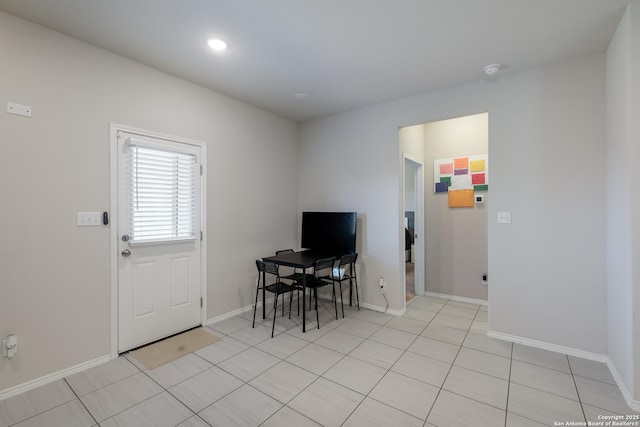 7731 Chatham, San Antonio, TX 78218 - dining room featuring baseboards and light tile patterned floors