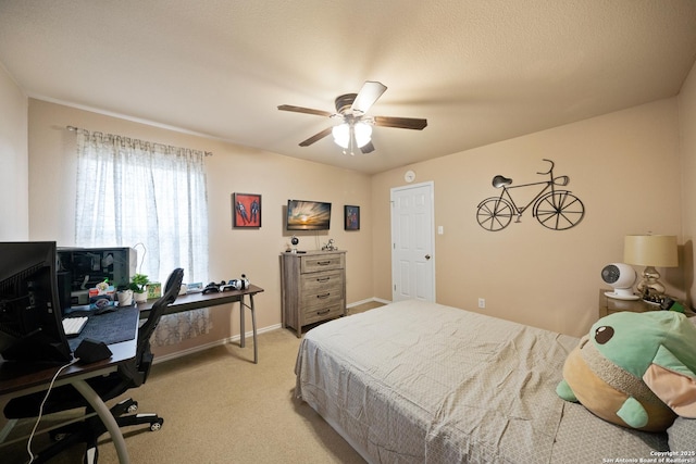 15206 Redbird Mnr, San Antonio, TX 78253 - bedroom with light carpet, an office area, baseboards, and a ceiling fan