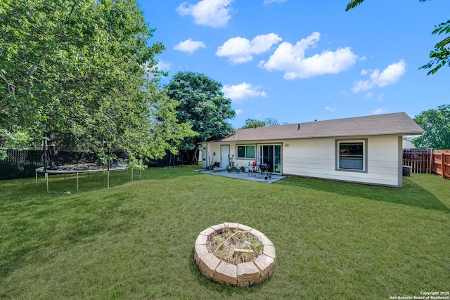 8239 Glen Lark, San Antonio, TX 78239 - rear view of house featuring a trampoline and a patio