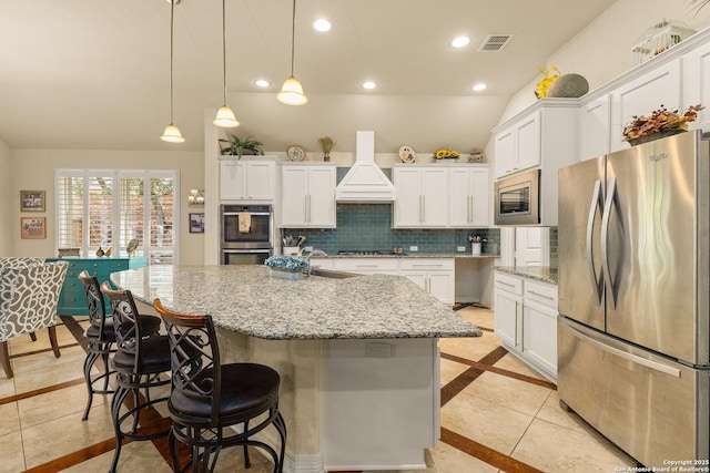 28914 Gracies Sky, San Antonio, TX 78260 - kitchen featuring stainless steel appliances, custom range hood, inlaid floor details, white cabinets, and a sink