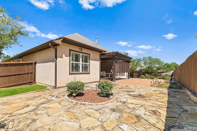 28914 Gracies Sky, San Antonio, TX 78260 - back of property with a pergola, a patio, a fenced backyard, and stucco siding