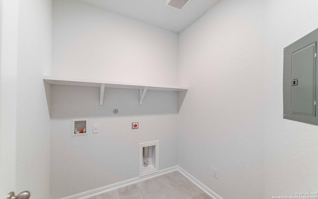 6726 Velma Path, San Antonio, TX 78253 - laundry area with electric panel, hookup for an electric dryer, gas dryer hookup, hookup for a washing machine, and baseboards