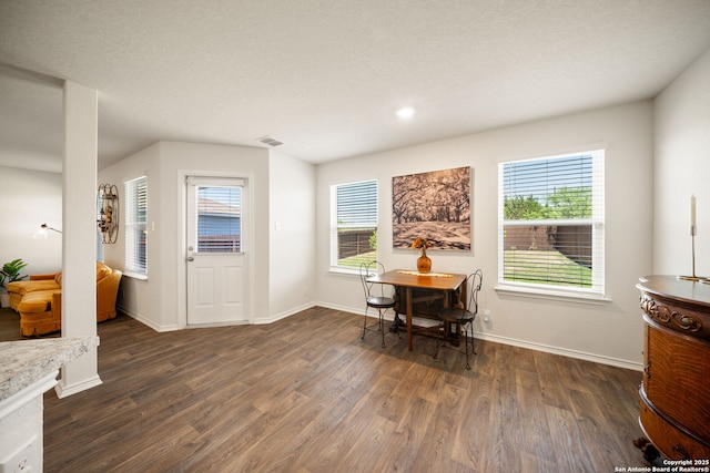 9827 Western Sedge, San Antonio, TX 78254 - dining room with wood finished floors, healthy amount of natural light, baseboards, and recessed lighting