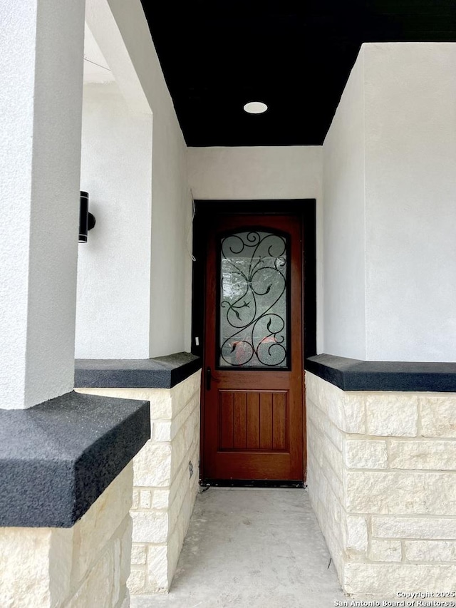 6427 Ridge Cir, San Antonio, TX 78233 - view of exterior entry featuring stucco siding