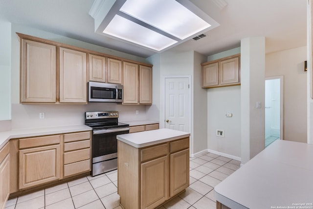 9419 Camino Venado, Helotes, TX 78023 - kitchen featuring stainless steel appliances, light brown cabinets, and light tile patterned floors