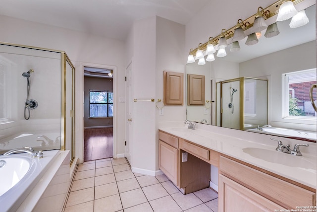 9419 Camino Venado, Helotes, TX 78023 - full bath featuring a shower stall, a garden tub, tile patterned flooring, and double vanity