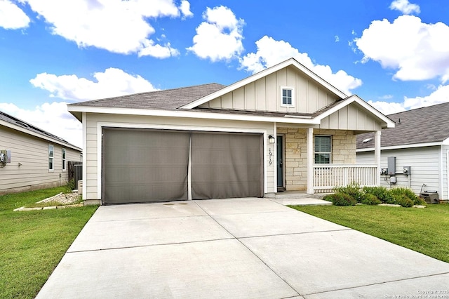 1919 Goldfinch, New Braunfels, TX 78130 - view of front of property featuring a porch, board and batten siding, a garage, concrete driveway, and a front lawn