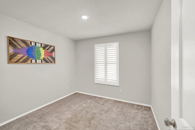 1919 Goldfinch, New Braunfels, TX 78130 - spare room with carpet floors, baseboards, and recessed lighting