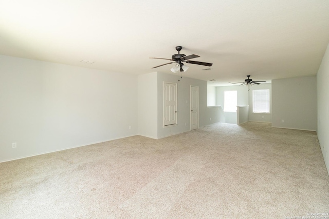 13131 Piper Sonoma, San Antonio, TX 78253 - spare room featuring ceiling fan, light carpet, and baseboards