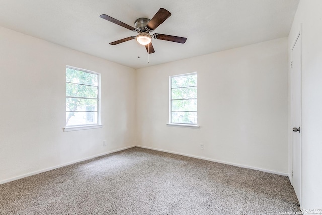 1319 Keats, San Antonio, TX 78211 - spare room with carpet flooring, a ceiling fan, and baseboards