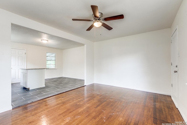 1319 Keats, San Antonio, TX 78211 - empty room featuring hardwood / wood-style floors, ceiling fan, and baseboards