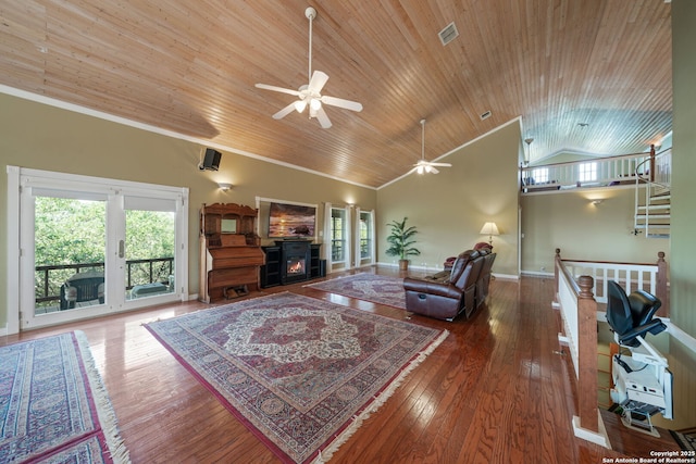388 Oak, Pipe Creek, TX 78063 - living area with a ceiling fan, healthy amount of natural light, wood ceiling, lofted ceiling, and hardwood / wood-style floors