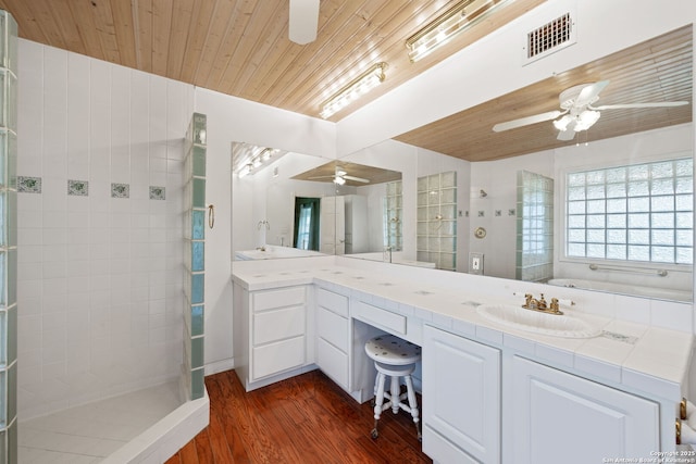 388 Oak, Pipe Creek, TX 78063 - full bath featuring a ceiling fan, wood ceiling, walk in shower, wood finished floors, and double vanity