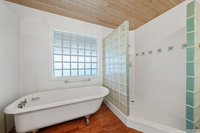 388 Oak, Pipe Creek, TX 78063 - bathroom featuring wood finished floors, a soaking tub, a walk in shower, and wooden ceiling