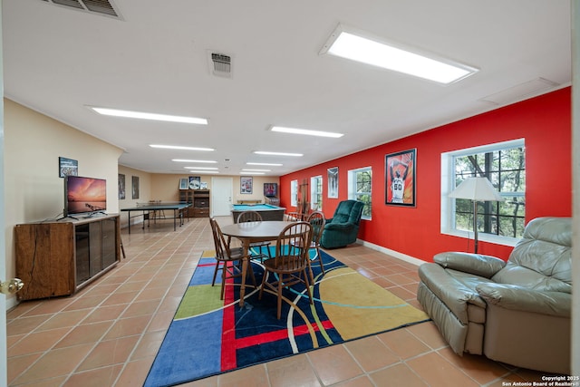 388 Oak, Pipe Creek, TX 78063 - tiled dining room with pool table and baseboards
