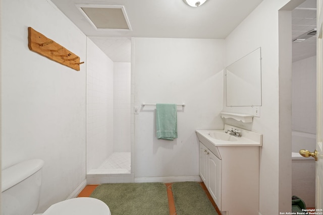 388 Oak, Pipe Creek, TX 78063 - full bath featuring toilet, a tile shower, vanity, and baseboards