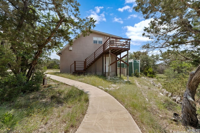 388 Oak, Pipe Creek, TX 78063 - back of house featuring a deck and stairway