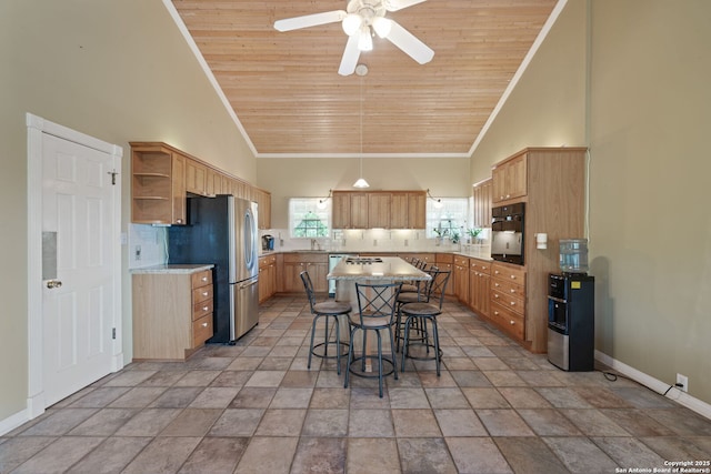 388 Oak, Pipe Creek, TX 78063 - kitchen with oven, open shelves, tasteful backsplash, wooden ceiling, and high vaulted ceiling