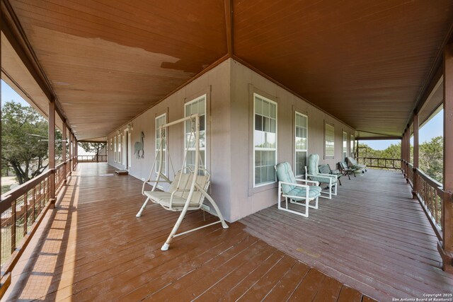 388 Oak, Pipe Creek, TX 78063 - wooden deck with covered porch